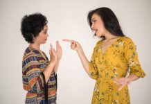Two women arguing and distrusting each other