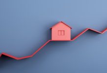 Rising property values concept with red house layout on rising red line graph on abstract blue background